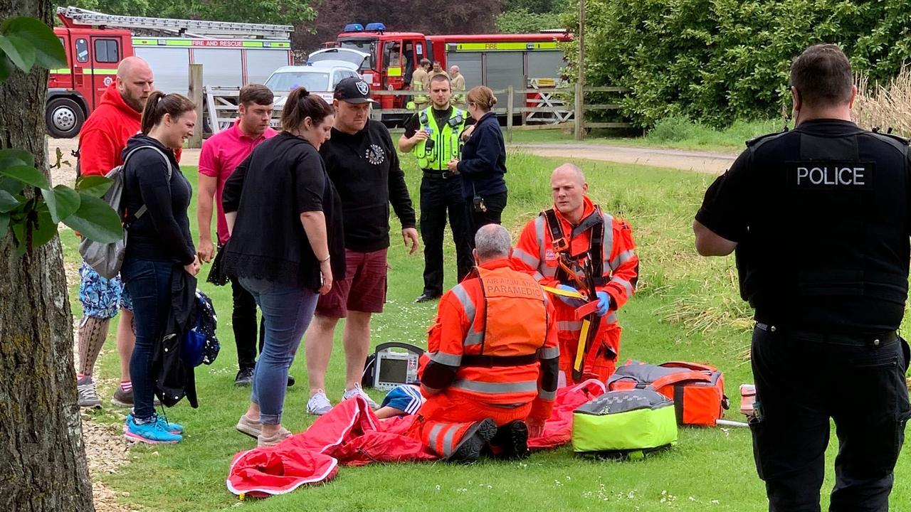Paramedics attend to a boy who fell from a roller coaster at Lightwater Valley theme park. Picture: Simon Moran/Getty Images