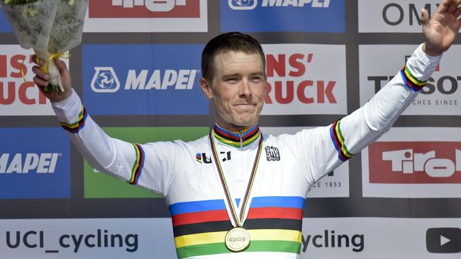 Winner Rohan Dennis of Australia celebrates on the podium after winning the Men's Individual Time Trial (ITT) road race between Rattenberg and Innsbruck during the UCI Cycling Road World Championships on September 26, 2018 in Austria. (Photo by HERBERT NEUBAUER / APA / AFP) / Austria OUT