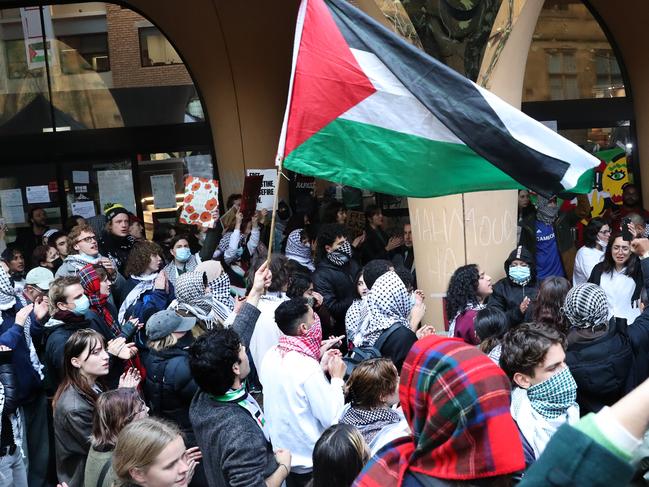 MELBOURNE, AUSTRALIA - NewsWire Photos, MAY 17, 2024. Pro Palestine protesters continue to occupy the Arts Building at Melbourne University. Students gather to listen to a press conference outside the building.  Picture: NewsWire / David Crosling