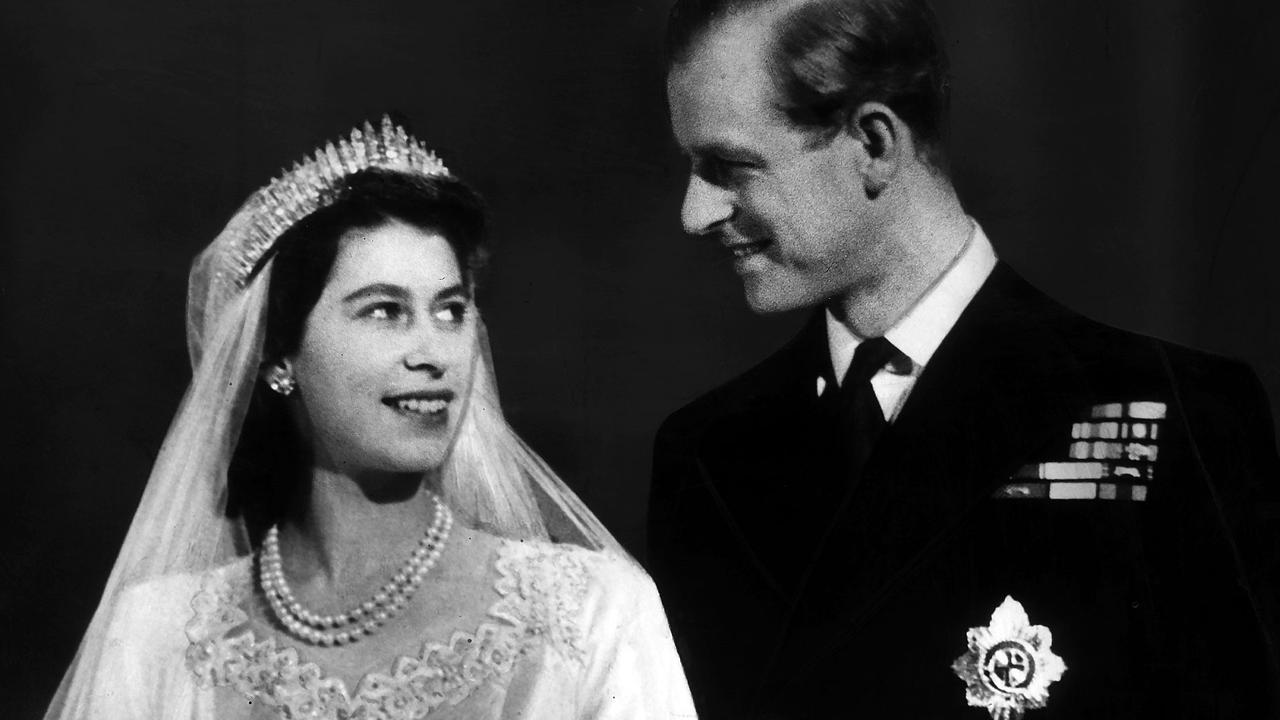 Princess Elizabeth and Lt Philip Mountbatten on their wedding day in 1947. Picture: Mega