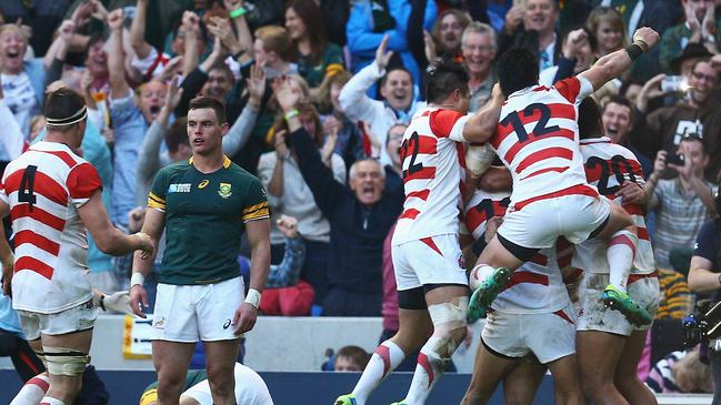 BRIGHTON, ENGLAND - SEPTEMBER 19: Karne Hesketh of Japan celebrates with his teammates following his winning try during the 2015 Rugby World Cup Pool B match between South Africa and Japan at the Brighton Community Stadium on September 19, 2015 in Brighton, United Kingdom. (Photo by Charlie Crowhurst/Getty Images)