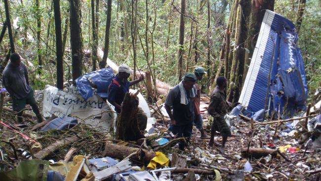 Rescue workers at the site of the crash.