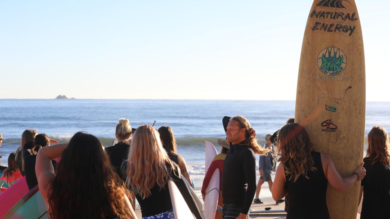 Members of the public took part in a paddle-out at Byron Bay's Main Beach to protest against the planned Netflix reality show Byron Baes on the morning of Tuesday, April 20, 2021. Picture: Liana Boss