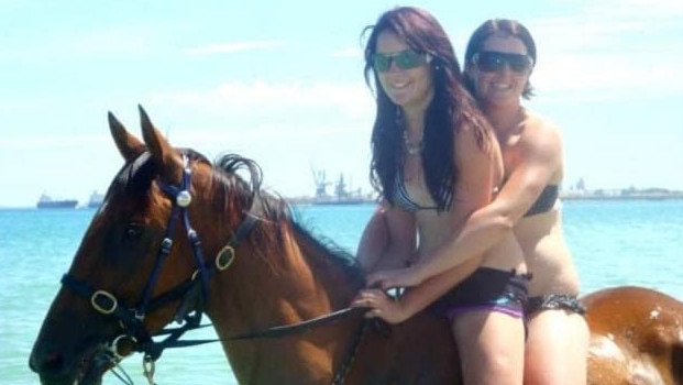 Trainer Summer Dickson (left, front) with her late sister Hana who passed away in 2016. Picture: Supplied by Summer Dickson