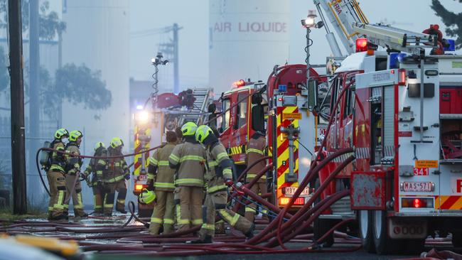 Firefighting crew and emergency response personal attend a factory fire in Sunshine. Picture: Brendan Beckett