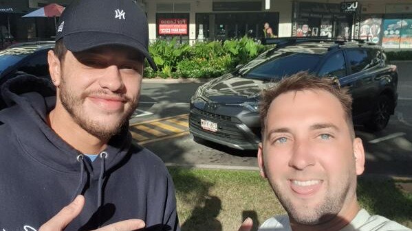 Actor and comedian Pete Davidson posing for pictures with fan Sean Fitzgerald on Cairns Esplanade. Photo: Instagram/@seanontour