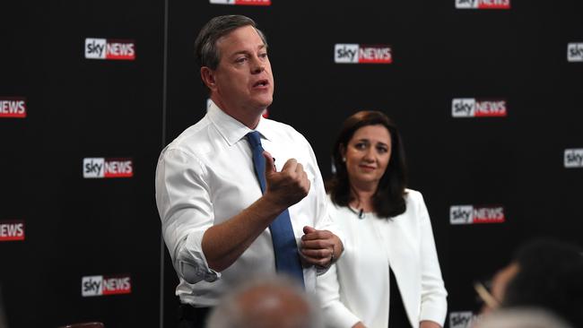 Queensland Premier Annastacia Palaszczuk (right) watches Leader of the Opposition Tim Nicholls during the debate. Picture: AAP.