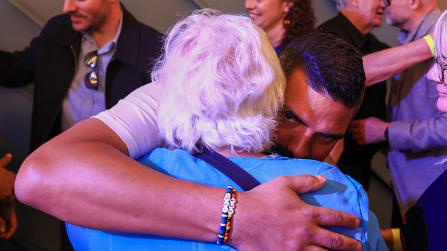 Dean Parkin hugs Aunty Shirley Lomas at Wests Ashfield Leagues Club. Picture: Jenny Evans/Getty Images