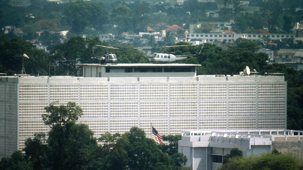 Evacuation helicopters wait on the roof of the American Embassy in Saigon as the city falls to the North Vietnamese in April 1975. Picture: Dirck Halstead/Liaison