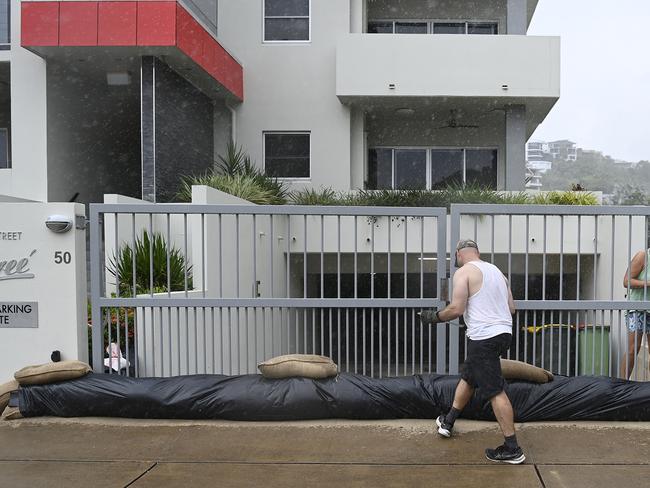 TOWNSVILLE, AUSTRALIA - JANUARY 25: Townsville residents are seen preparing their home for the on-coming Cyclone on January 25, 2024 in Townsville, Australia. A cyclone watch zone has been issued for large parts of north Queensland, as the Bureau of Meteorology said tropical Cyclone Kirrily will make landfall near Townsville on Thursday. (Photo by Ian Hitchcock/Getty Images)