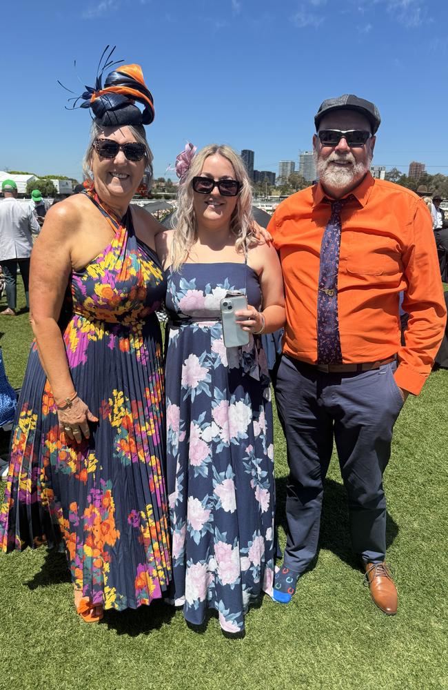 Jill, Amber and Paul Harrison at the Melbourne Cup at Flemington Racecourse on November 5, 2024. Picture: Phillippa Butt