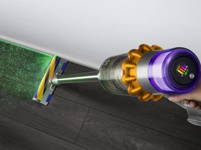 The Dyson V15 Detect Absolute is a stick vacuum with a laser head to reveal dust and dirt.