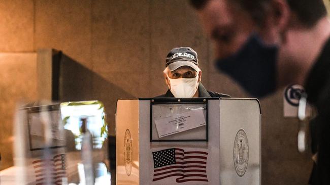 People vote at Lincoln Center during early voting for the U.S. Presidential election on October 24 in New York City. Picture: AFP