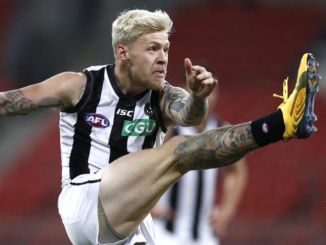 SYDNEY, AUSTRALIA - JUNE 26: Jordan De Goey of the Magpies kicks during the round 4 AFL match between Greater Western Sydney Giants and Collingwood Magpies at GIANTS Stadium on June 26, 2020 in Sydney, Australia. (Photo by Ryan Pierse/Getty Images)