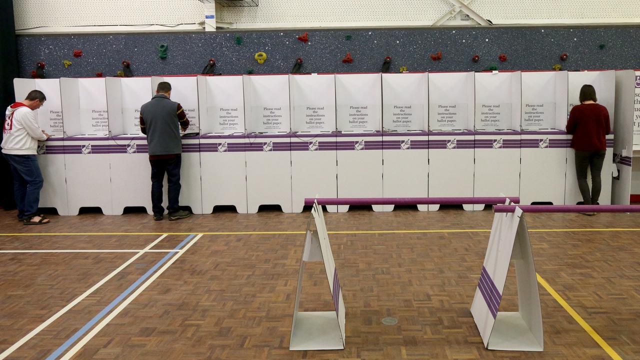 People voting at the Stirling East Primary School polling booth in Adelaide on July 28, 2018. Australians have the right to safely cast a secret vote to elect the politicians who represent them. Picture: AAP