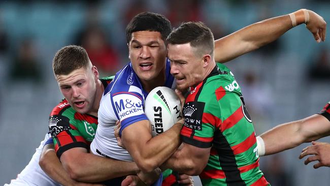 Canterbury’s Dallin Watene-Zelezniak collides with South Sydney’s Damien Cook at ANZ Stadium