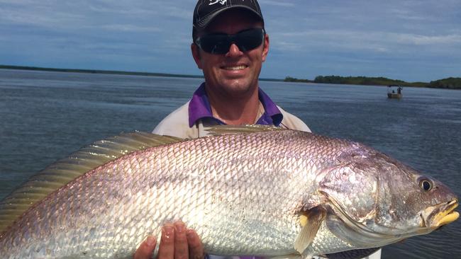 Adam Mckenzie with his 113cm barra caught at Adelaide River