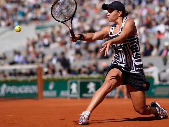 Ashleigh Barty plays a backhand return to Czech Republic's Marketa Vondrousova.