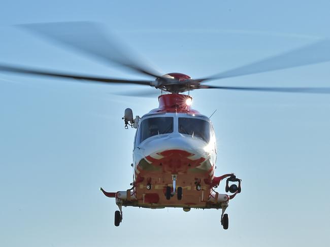 An Ambulance Victoria HEMS Air Ambulance takes off from the Grovedale Recreation Reserve. Picture: Stephen Harman