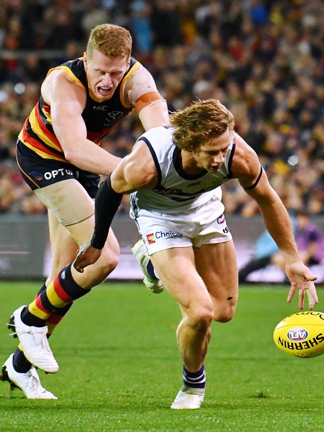 Reilly O’Brien hot on the heels of Fremantle superstar Nat Fyfe. Picture: Mark Brake/Getty Images