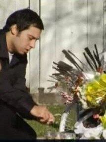 Family gather at the crash site in Los Angeles. Picture: NBCLA