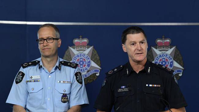 Australian Federal Police, Acting Deputy Commissioner Ian McCartney (Left) and Victorian Police, Deputy Commissioner Shane Paton addresses the media at the Victorian Police Centre in Docklands in Melbourne on Tuesday, November 28, 2017. Victorian Police Special Operations Group have arrested a 20-year-old Werribee man in undertaking preparations for planning a terrorist act in Melbourne on New Years Eve this year. (AAP Image/James Ross) NO ARCHIVING