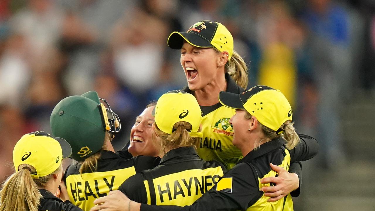 Megan Schutt of Australia celebrates with Meg Lanning and her teammates after dismissing Shafali Verma of India during the Women's T20 World Cup final match between Australia and India at the MCG in Melbourne, Sunday, March 8, 2020. (AAP Image/Scott Barbour) NO ARCHIVING, EDITORIAL USE ONLY, IMAGES TO BE USED FOR NEWS REPORTING PURPOSES ONLY, NO COMMERCIAL USE WHATSOEVER, NO USE IN BOOKS WITHOUT PRIOR WRITTEN CONSENT FROM AAP