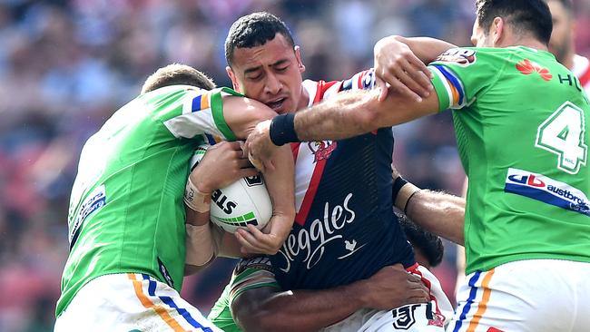 BRISBANE, AUSTRALIA - MAY 12: Sio Siua Taukeiaho of the Roosters takes on the defence during the round nine NRL match between the Sydney Roosters and the Canberra Raiders at Suncorp Stadium on May 12, 2019 in Brisbane, Australia. (Photo by Bradley Kanaris/Getty Images)