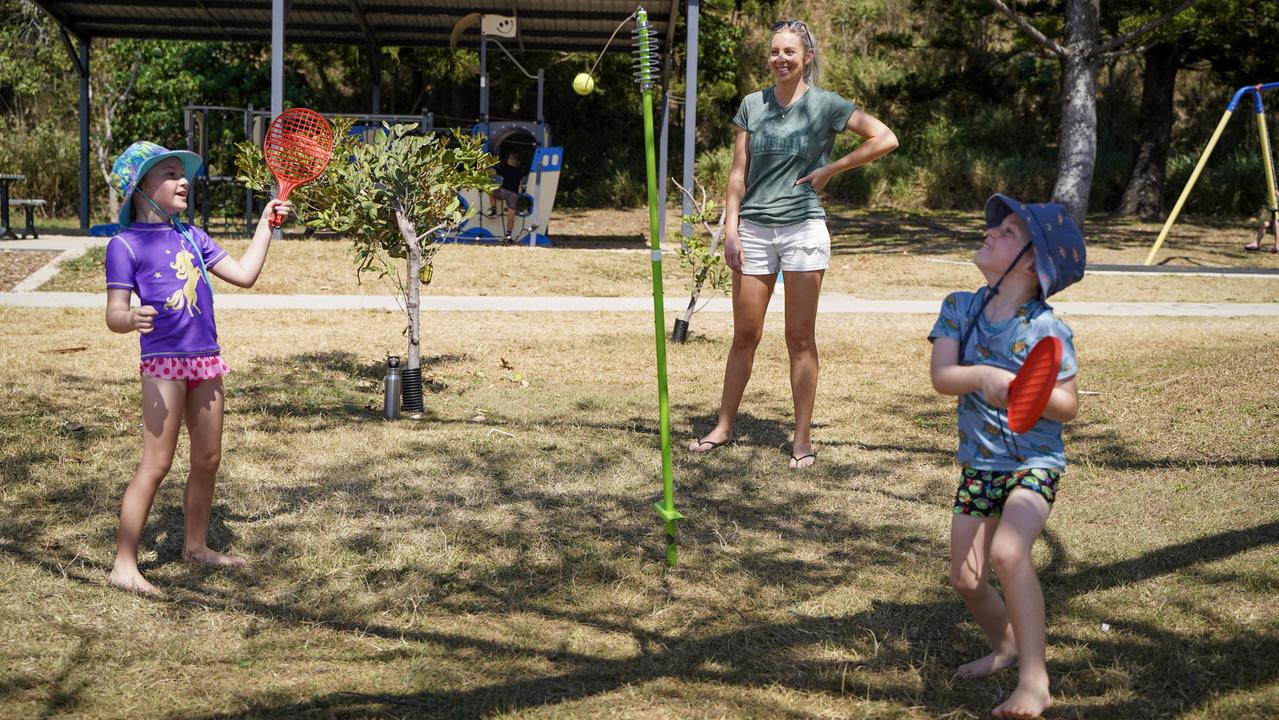 Kirby Benson, with daughter Prue, 5, and son Ryan, 4, having fun at the Reclaim the Beach event to fight back after the recent stabbing at Blacks Beach. Picture: Heidi Petith