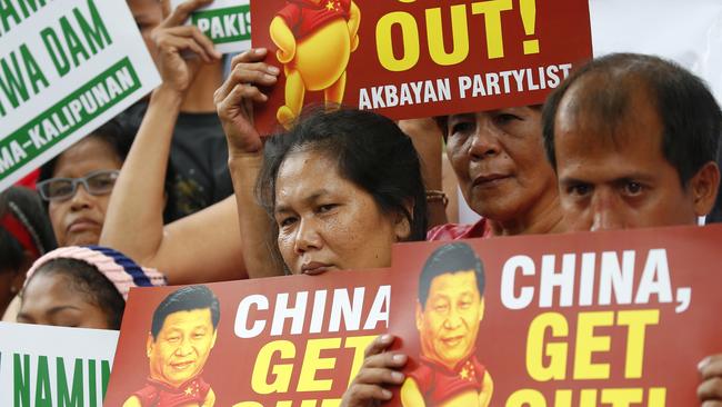 Protesters rally outside the Chinese Consulate to protest the two-day state visit in the country of President Xi Jinping in Manila in 2018. Picture: AP