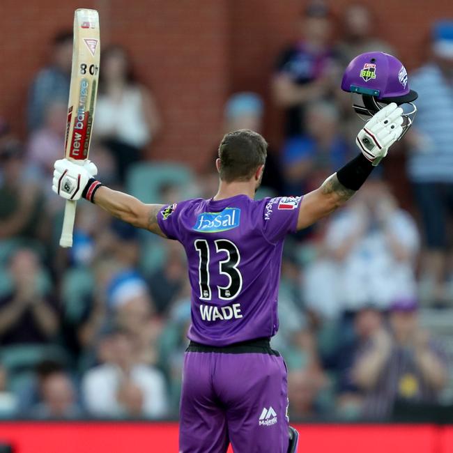 Matthew Wade celebrates his century during the Big Bash League match against the Adelaide Strikers. Picture: JAMES ELSBY/GETTY IMAGES