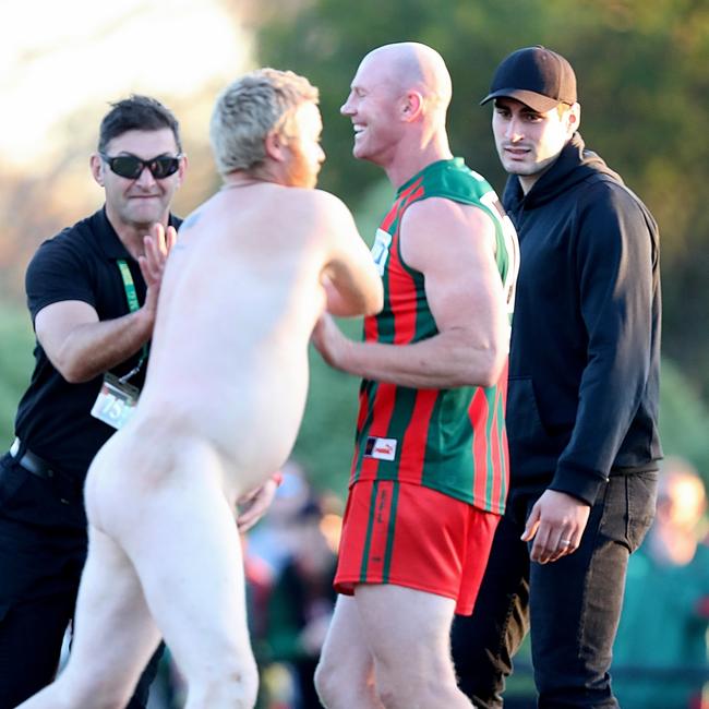 Barry Hall playing for The Basin vs Heathmont at Batterham Reserve in Boronia. A Streaker runs toward Barry at the end of the game. Picture: Alex Coppel.