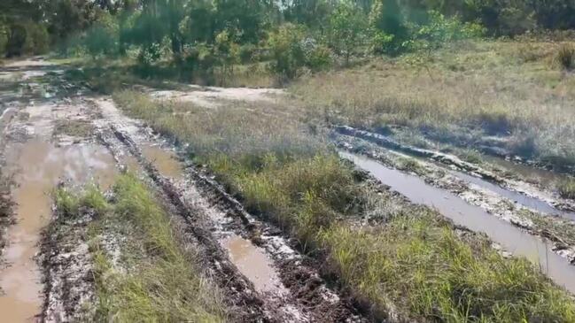 Mary Allen explains the worst parts of the unformed section of Richards Road, Pacific Haven.