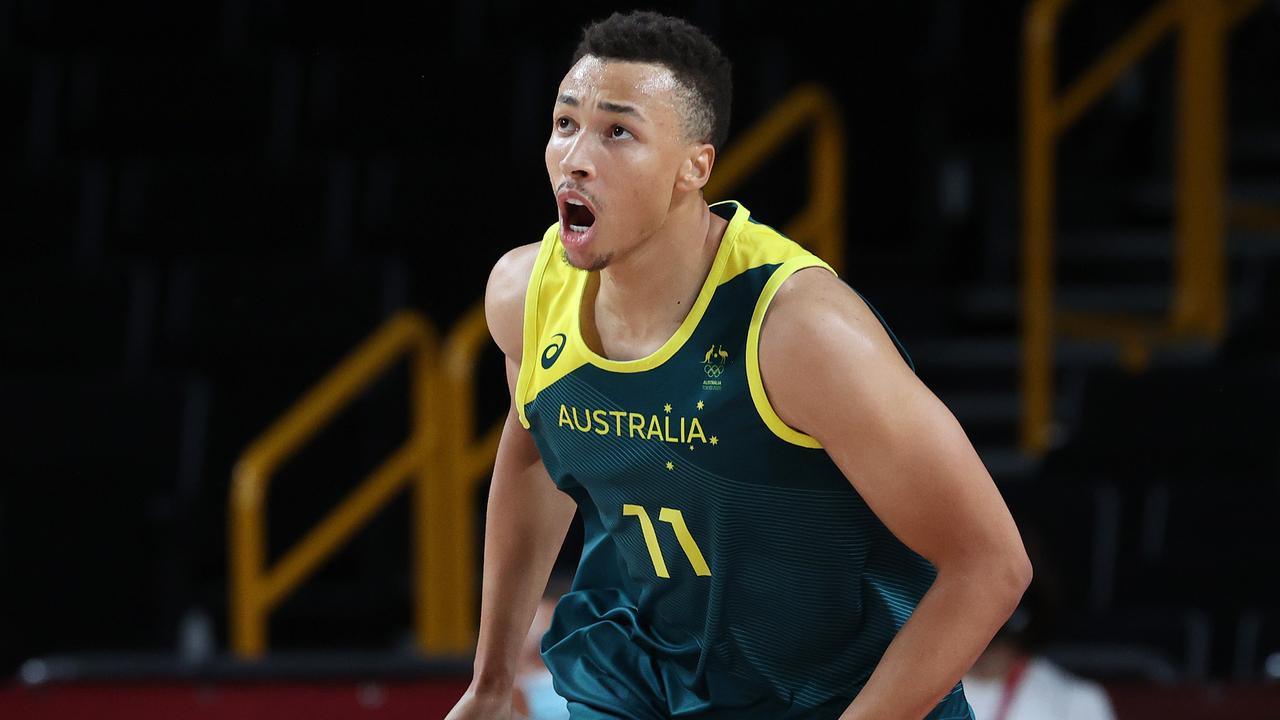 SAITAMA, JAPAN - AUGUST 07: Dante Exum #11 of Team Australia celebrates against Team Slovenia during the second half of the Men's Basketball Bronze medal game on day fifteen of the Tokyo 2020 Olympic Games at Saitama Super Arena on August 07, 2021 in Saitama, Japan. (Photo by Kevin C. Cox/Getty Images)