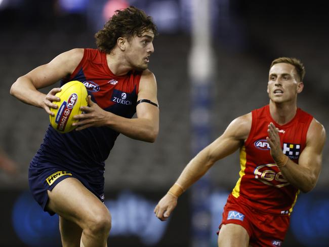 MELBOURNE, AUSTRALIA - AUGUST 01: Luke Jackson of the Demons runs with the ball during the round 20 AFL match between Gold Coast Suns and Melbourne Demons at Marvel Stadium on August 01, 2021 in Melbourne, Australia. (Photo by Daniel Pockett/Getty Images)