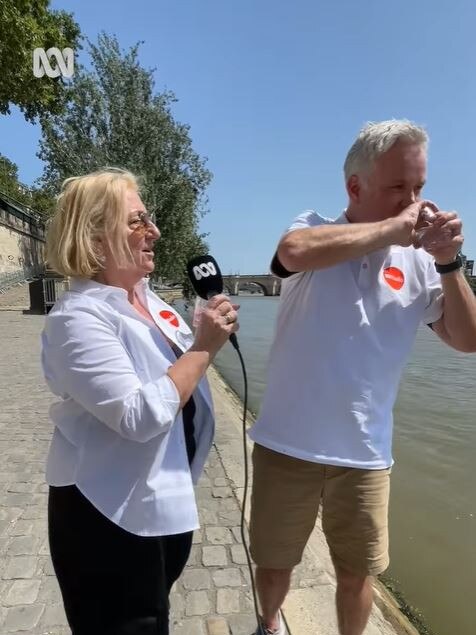 Jules Schiller “drinks” Seine River water while in Paris for the Paris Olympics. Picture: Instagram / ABC