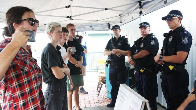 Protesters in a stand-off with police yesterday. Picture: AAP/Jono Searle