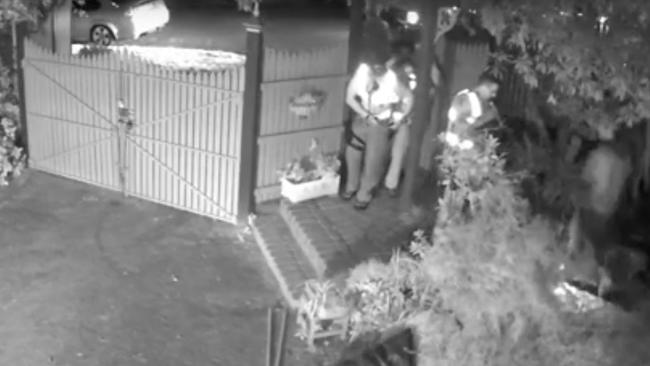 Video played to the Coroners Court shows four police entering the Glen Waverley home.