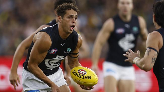 Ed Curnow was sent to Dion Prestia in the final quarter with great effect, limiting the clearance king to one disposal after he had 22 at the final break. Picture: Daniel Pockett/Getty Images