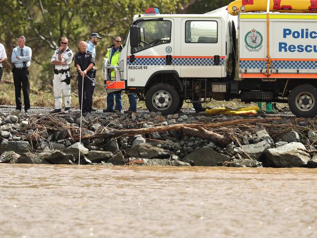 Police divers and emergency workers during the recovery effort. Picture: Lyndon Mechielsen