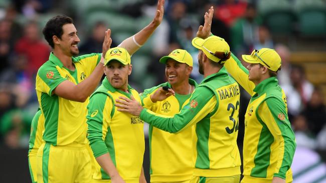 The Australians celebrate the win after the final wicket fell.