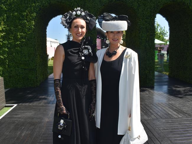 Guests in striking racewear at Penfolds Derby Day at the Flemington Racecourse on Saturday, November 02, 2024: Mikayla Trotter and Robyn Durnford. Picture: Jack Colantuono