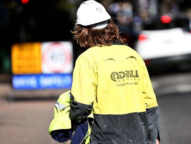 BRISBANE, AUSTRALIA - NewsWire Photos - AUGUST 23, 2022.Tradesmen (Tradies) on the job in Brisbane. Australia is facing a looming tradie crisis amid concerns one third of electrical apprentices have considered quitting the profession. Picture: NCA NewWire / Dan Peled