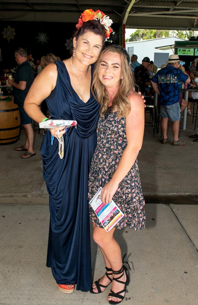 Jo Day from North Mackay and Alanta Rogers from Beaconsfield at the Hawaiian Christmas Race Day. Mackay Turf Club, Ooralea. Picture: Michaela Harlow