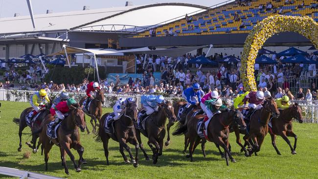 Thrilling finish to the Coolmore Classic won by Andrew Adkins and Daysee Doom (rails). Picture: AAP