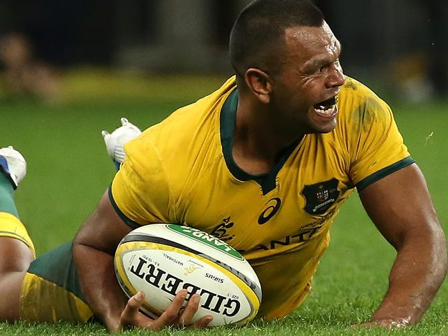 PERTH, AUSTRALIA - AUGUST 10: Kurtley Beale of the Wallabies looks up after crossing for try during the 2019 Rugby Championship Test Match between the Australian Wallabies and the New Zealand All Blacks at Optus Stadium on August 10, 2019 in Perth, Australia. (Photo by Paul Kane/Getty Images)