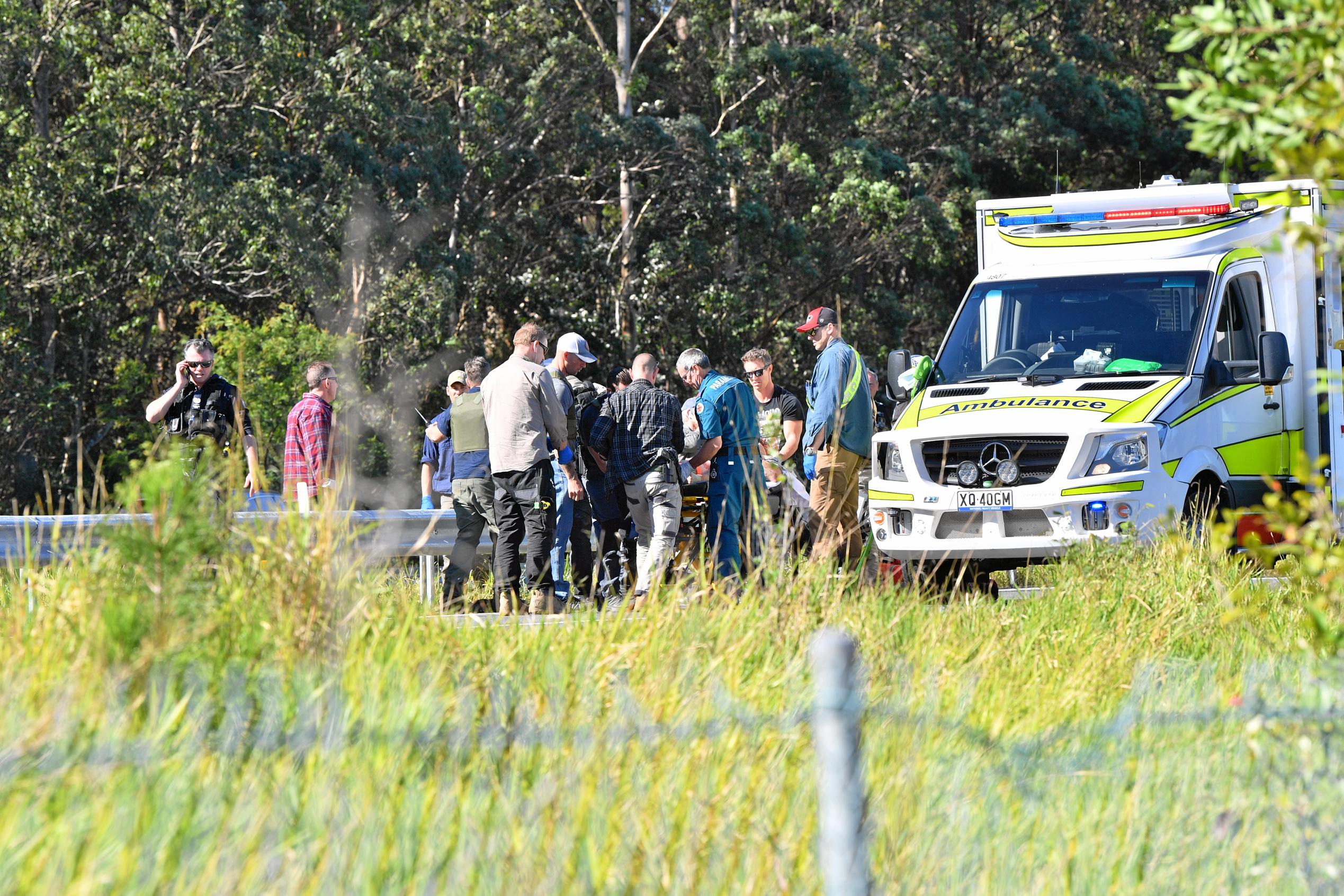 The police chased a car from north of Gympie and dozens of police apprehended a man near Parklands, just north of Nambour on the Bruce Highway. Traffic was stopped in both directions for several hours.