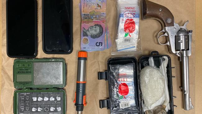 Police will alleged they found a gun, drugs, mobile phones, cash and paraphernalia during a search of a man's car.