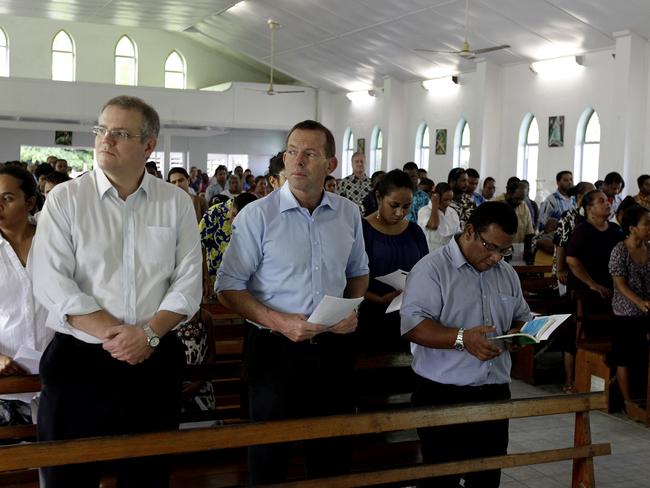 Scott Morrison attends a Sunday Morning Mass with Tony Abbott on Nauru. Picture: Brad Hunter/News Corp