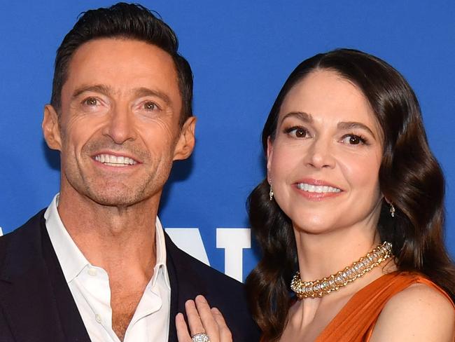 Australian actor Hugh Jackman and US actress Sutton Foster arrive for the opening night of Broadway music-hall "The Music Man" at Winter Garden Theater in New York City on February 10, 2022. (Photo by ANGELA  WEISS / AFP)